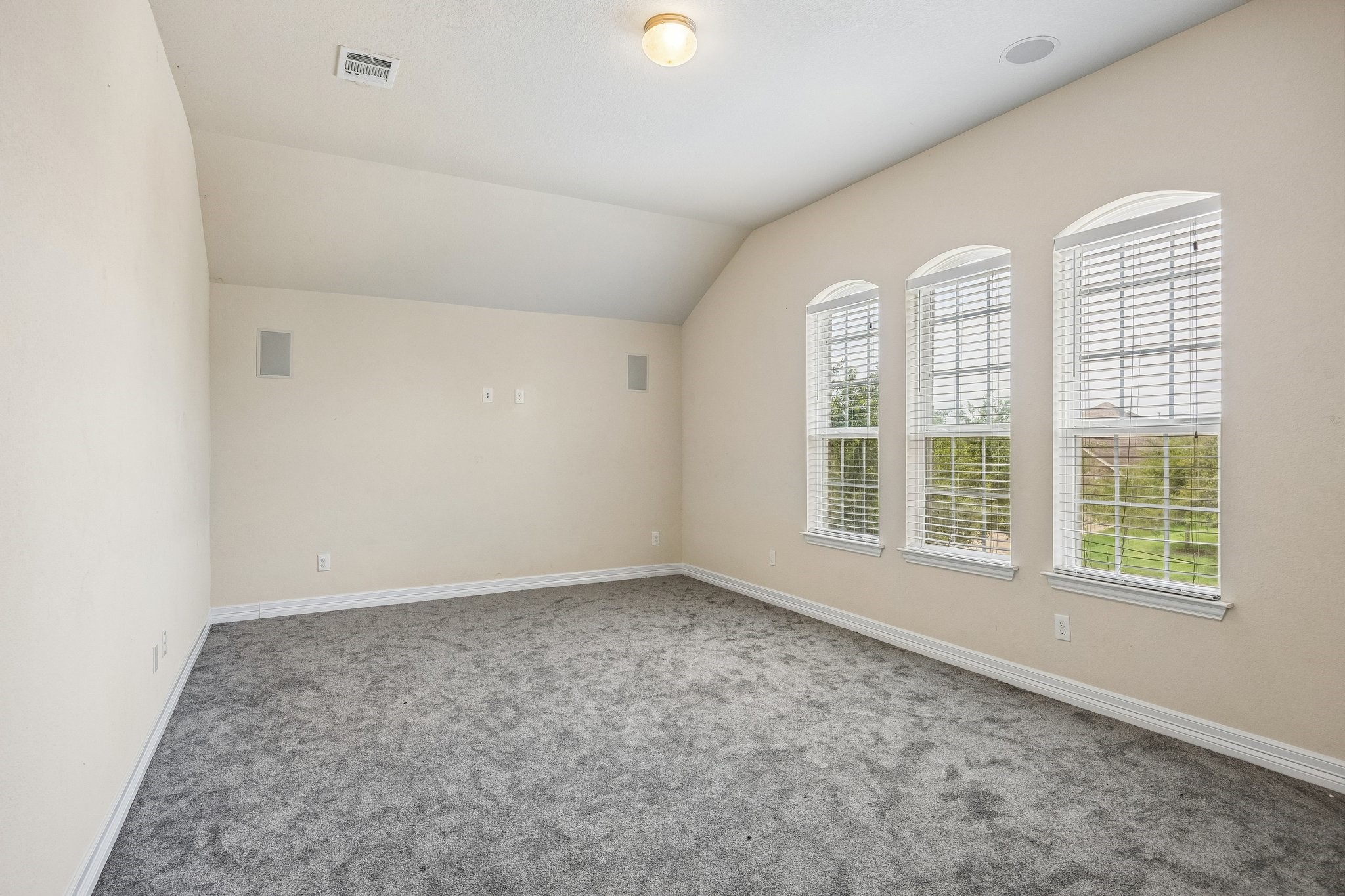 9707 Shimmering Lakes Drive Rosharon, TX 77583 - Photo 9 of 15 an empty room with windows