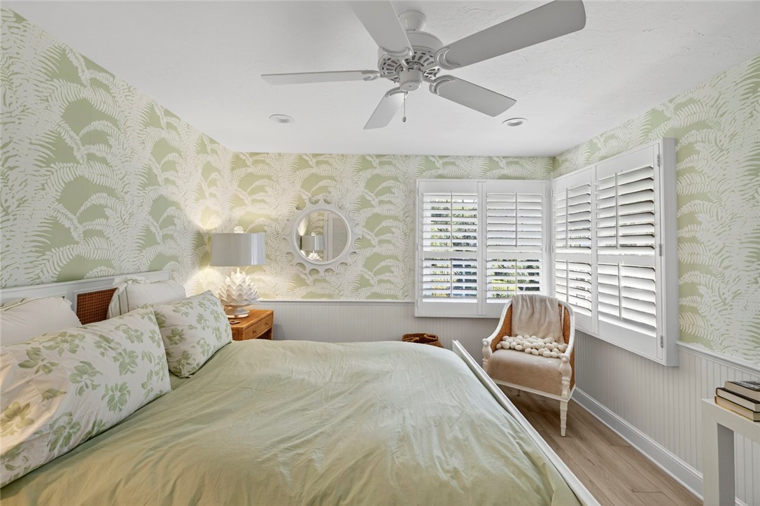 2525 Ocean Drive, Unit 3 Vero Beach, FL 32963 - Photo 19 of 36 a bedroom with a large bed and a window