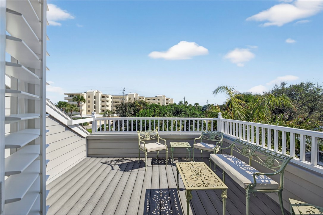 2525 Ocean Drive, Unit 3 Vero Beach, FL 32963 - Photo 25 of 36 a view of balcony with wooden floor and seating space