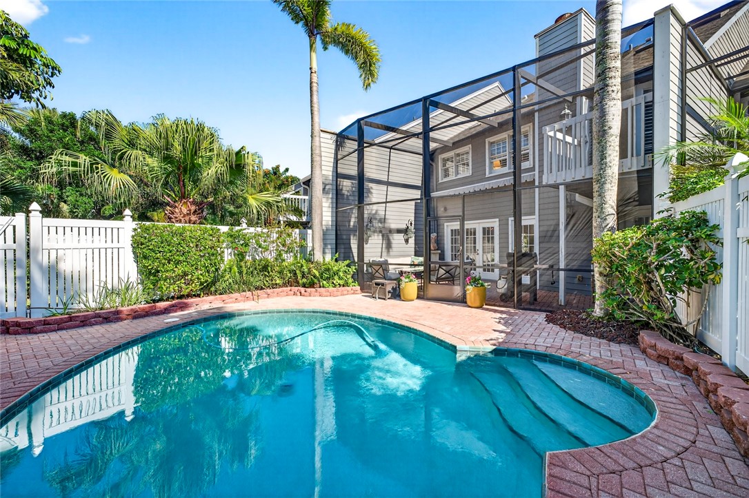 2525 Ocean Drive, Unit 3 Vero Beach, FL 32963 - Photo 33 of 36 a swimming pool with outdoor seating and yard