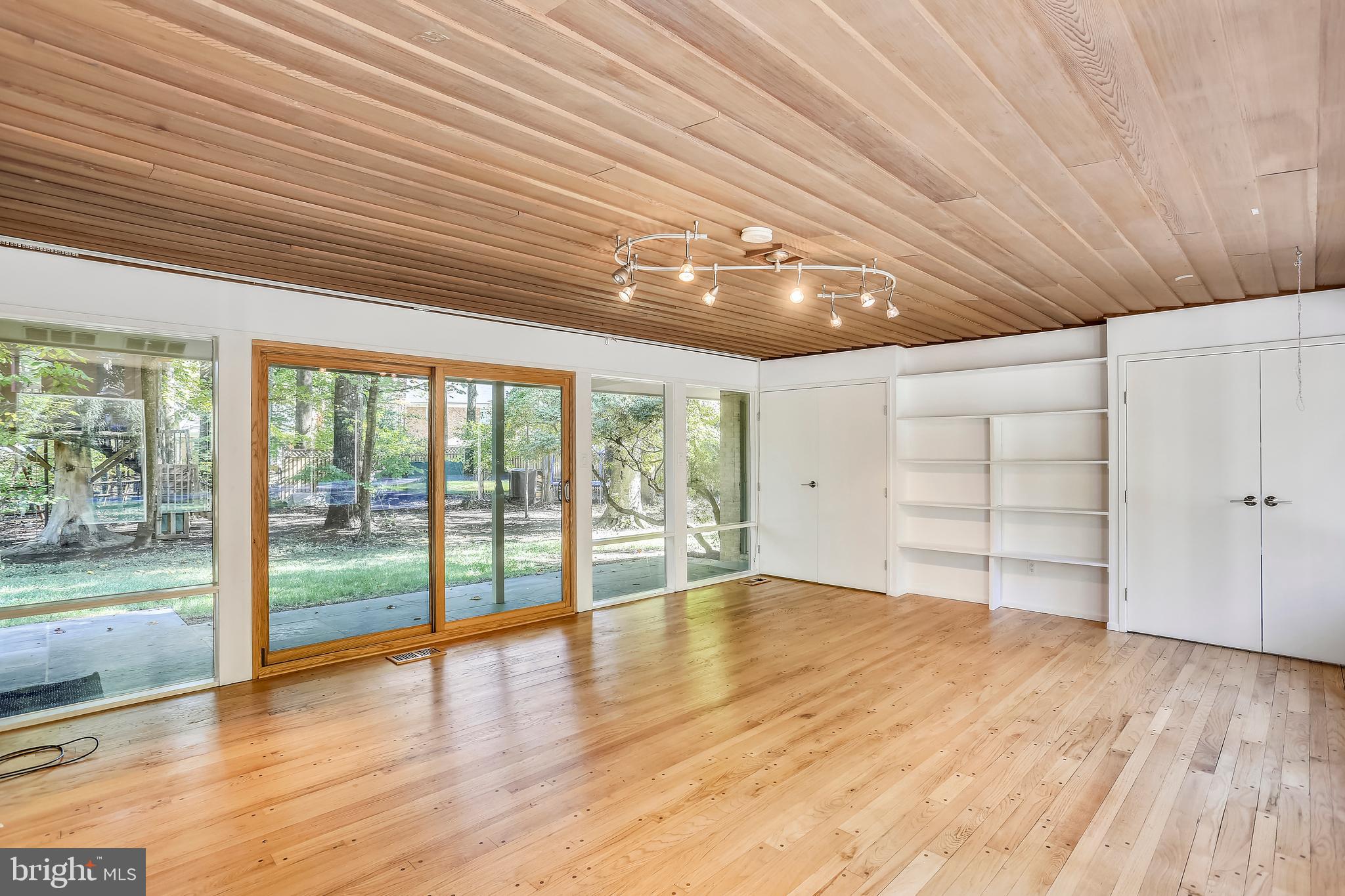 7504 Hamilton Spring Road Bethesda, MD 20817 - Photo 12 of 52 Stunning FR with walls of glass on front and back