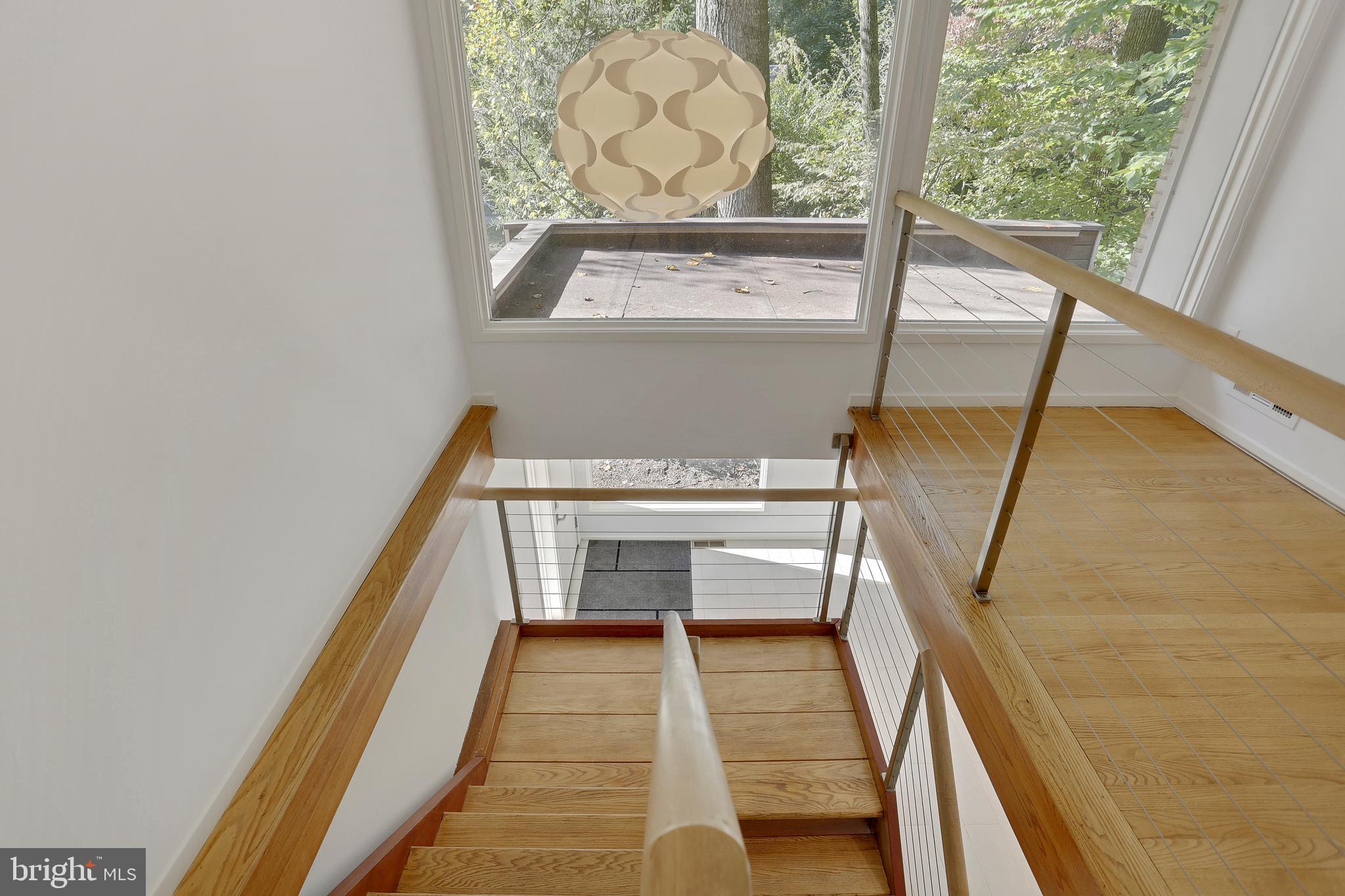 7504 Hamilton Spring Road Bethesda, MD 20817 - Photo 15 of 52 Sun filled stairwell
