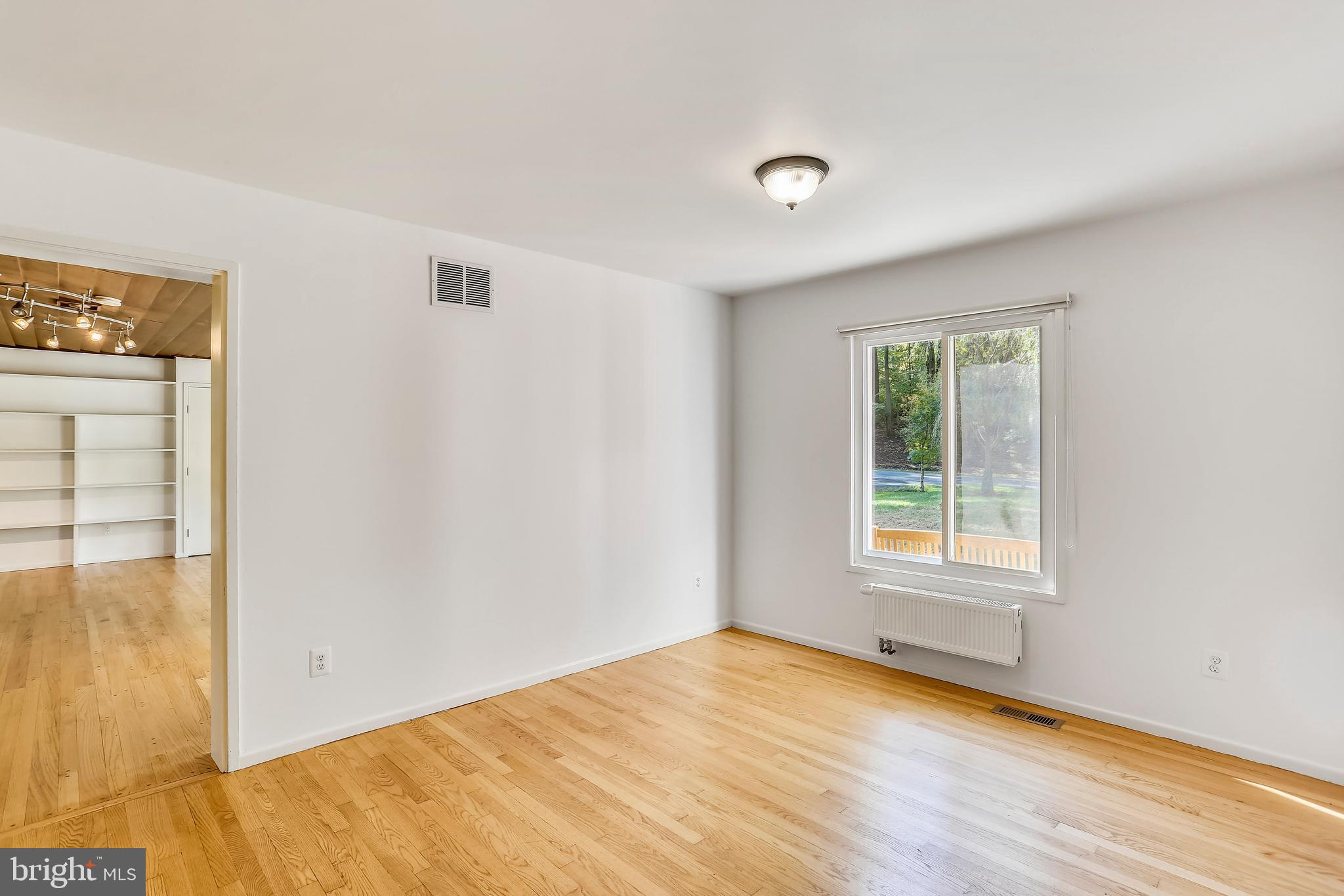 7504 Hamilton Spring Road Bethesda, MD 20817 - Photo 18 of 52 Dining room view to family room
