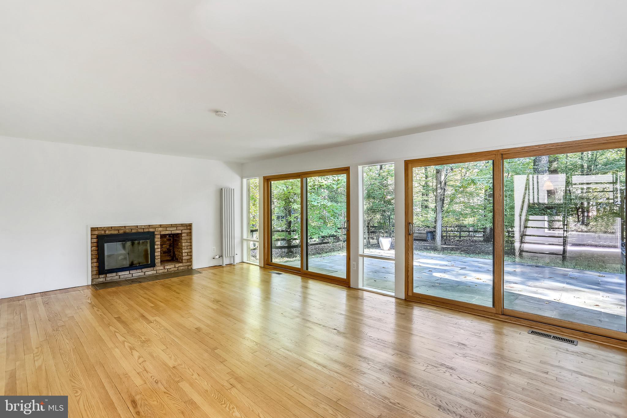7504 Hamilton Spring Road Bethesda, MD 20817 - Photo 3 of 52 View from living room to back patio