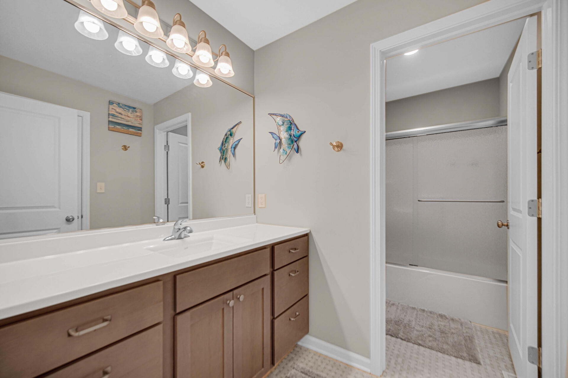 1023 East 117th Lane Crown Point, IN 46307 - Photo 17 of 22 a bathroom with a sink shower and a mirror