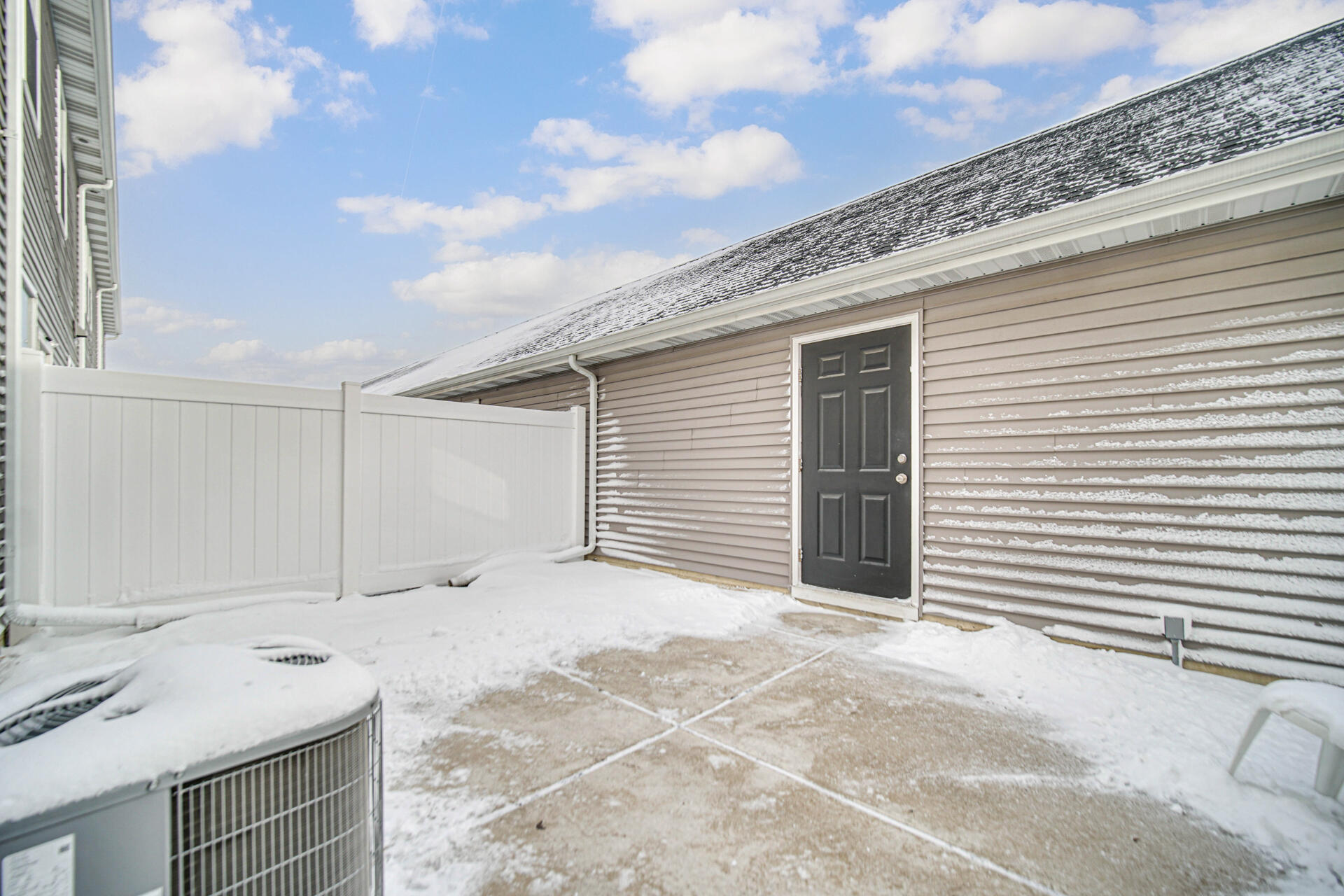 1023 East 117th Lane Crown Point, IN 46307 - Photo 19 of 22 a view of a house with a backyard and garage