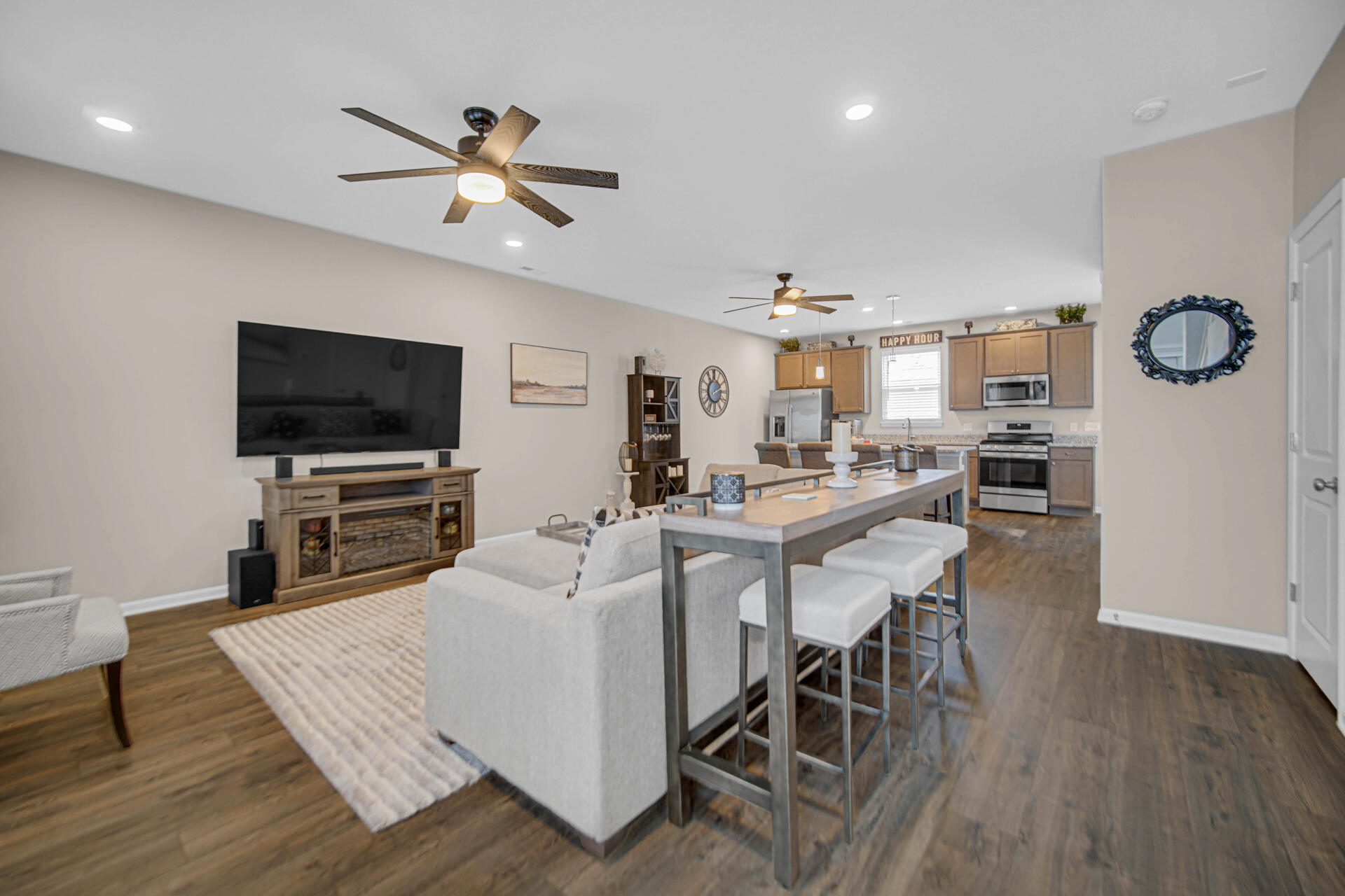 1023 East 117th Lane Crown Point, IN 46307 - Photo 4 of 22 a living room with furniture and a flat screen tv