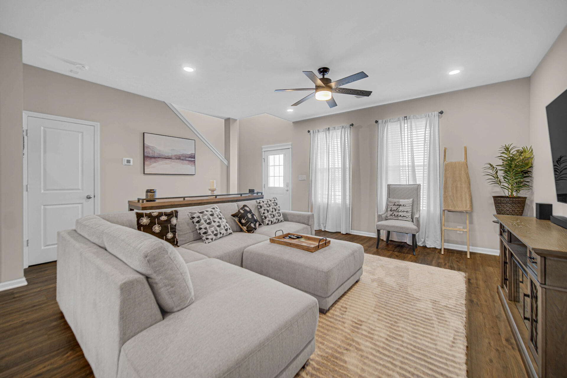 1023 East 117th Lane Crown Point, IN 46307 - Photo 7 of 22 a living room with furniture and a large window