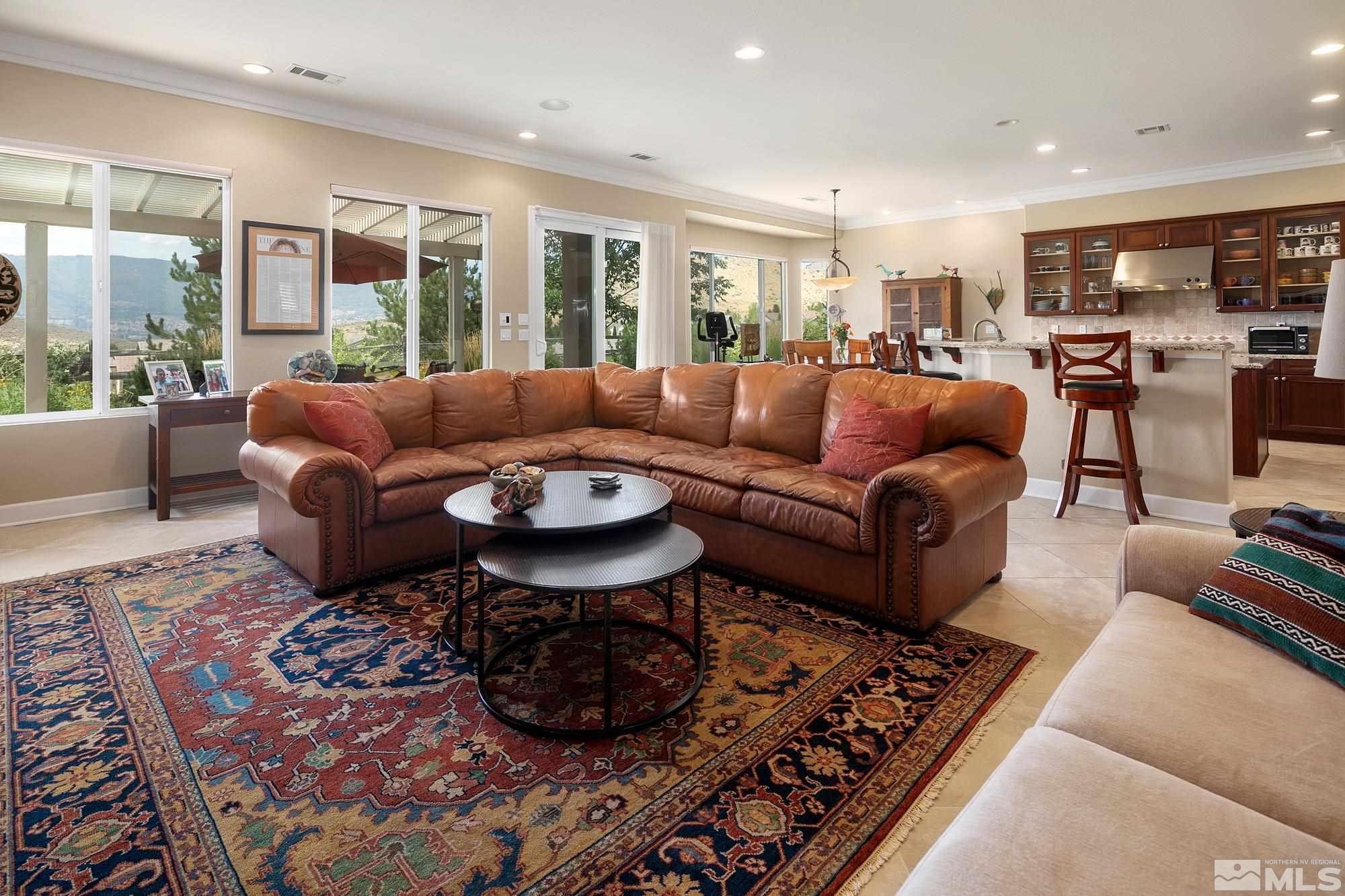 1605 Ashland Bluff Way Reno, NV 89523 - Photo 15 of 37 a living room with furniture and a large window