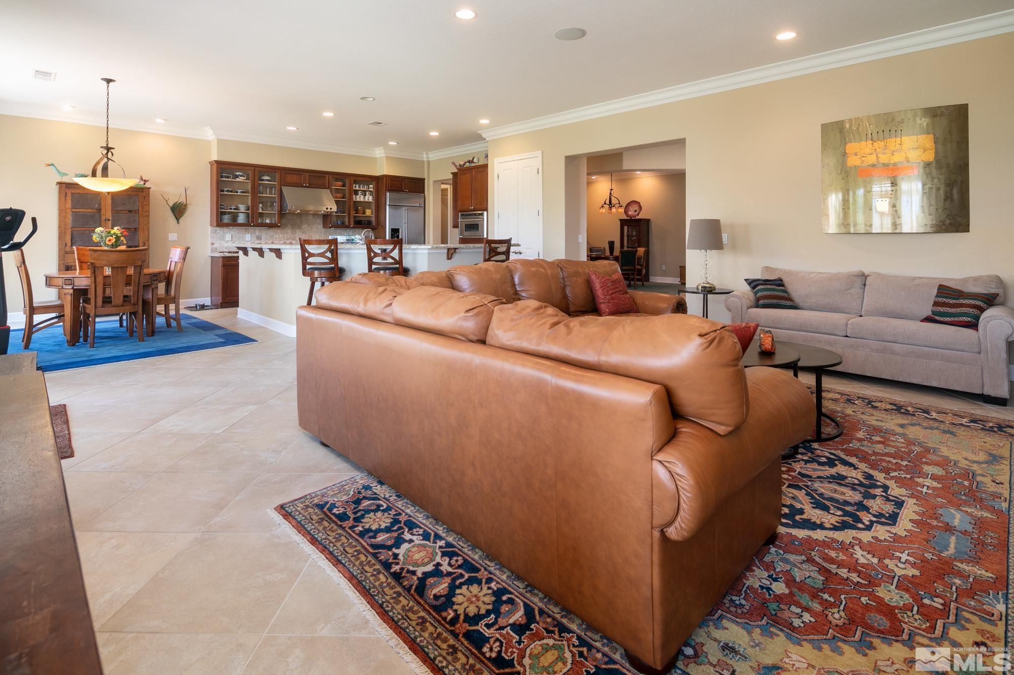 1605 Ashland Bluff Way Reno, NV 89523 - Photo 16 of 37 a living room with furniture and a flat screen tv