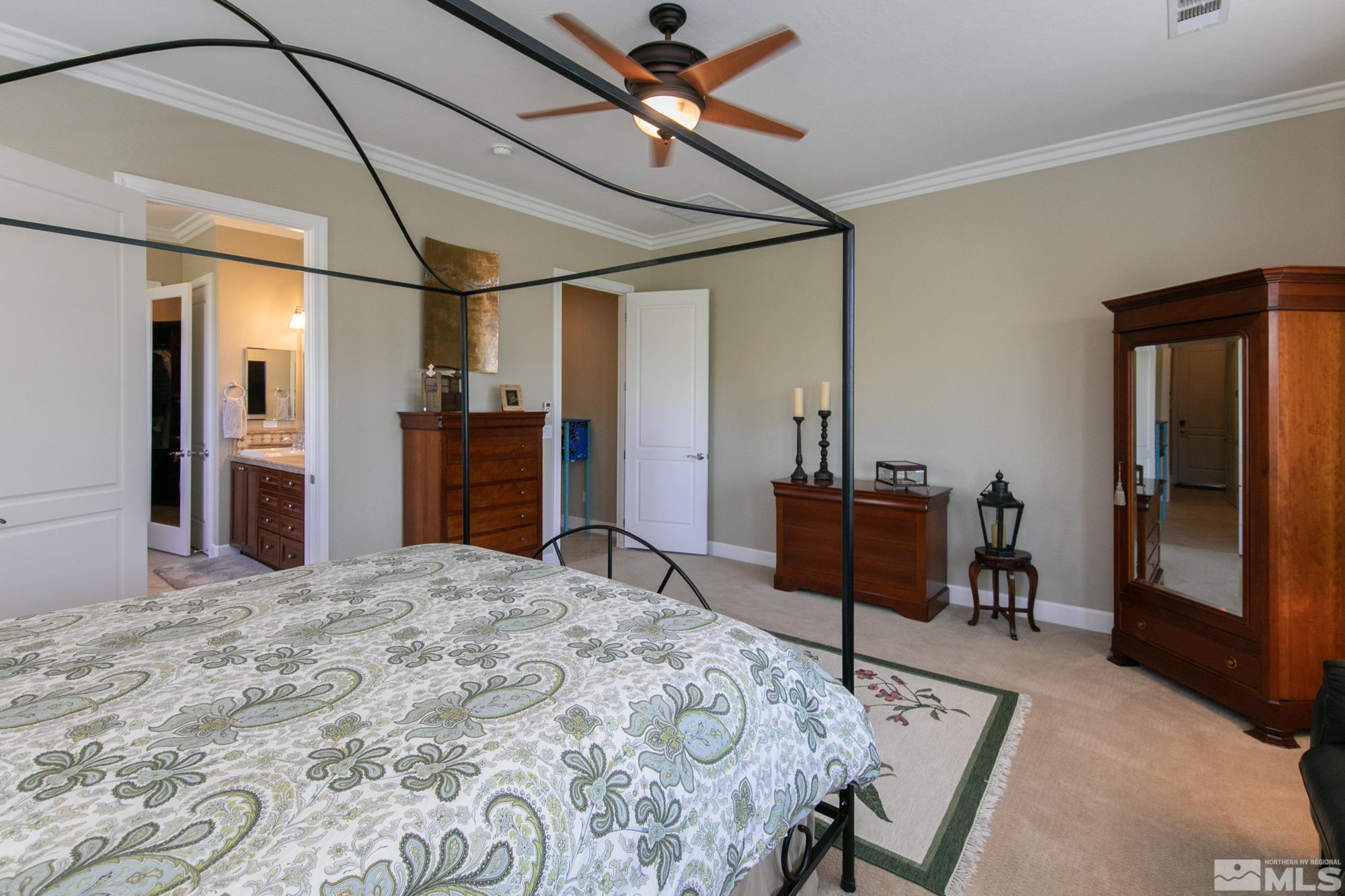 1605 Ashland Bluff Way Reno, NV 89523 - Photo 22 of 37 a bedroom with a bed and a dresser