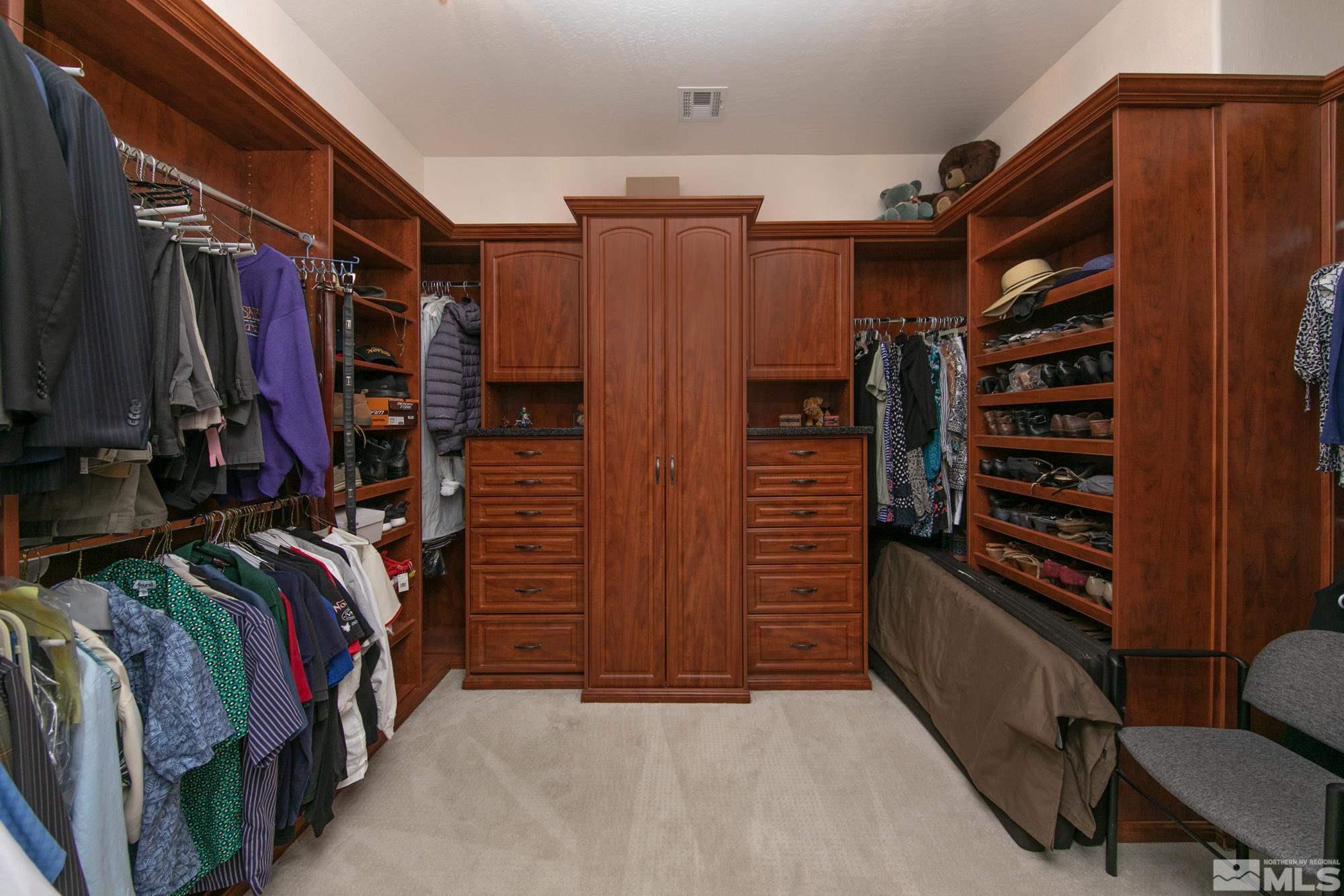 1605 Ashland Bluff Way Reno, NV 89523 - Photo 26 of 37 a view of walk in closet with clothes
