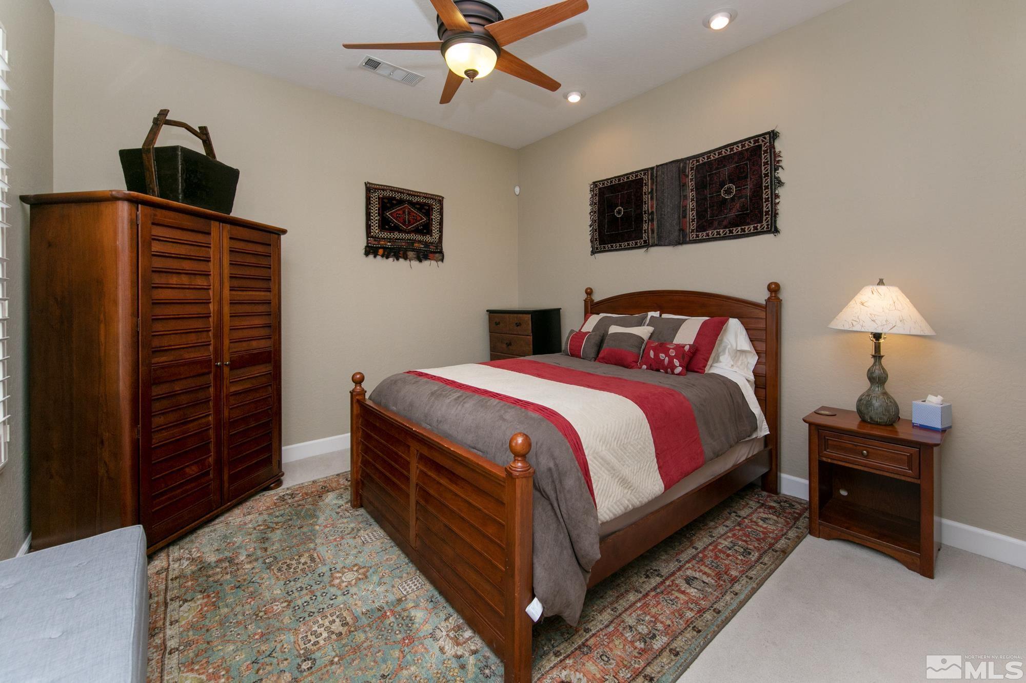 1605 Ashland Bluff Way Reno, NV 89523 - Photo 28 of 37 a bedroom with a bed and a television