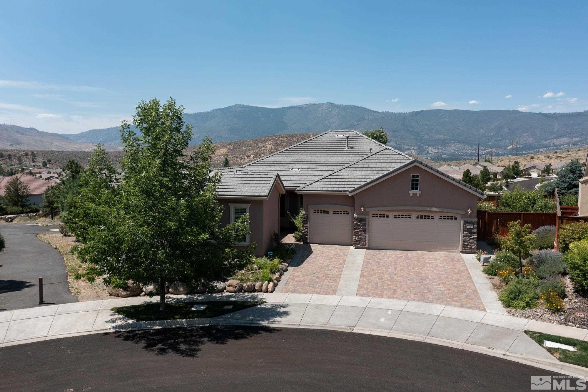 1605 Ashland Bluff Way Reno, NV 89523 - Photo 3 of 37 an aerial view of a house with a garden and lake view