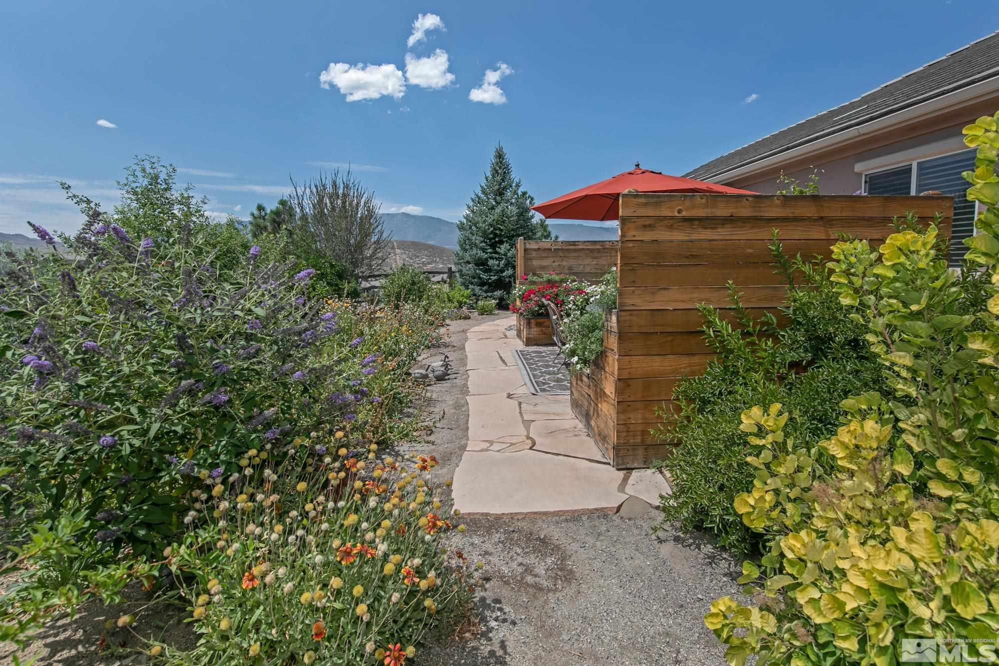 1605 Ashland Bluff Way Reno, NV 89523 - Photo 36 of 37 a view of a house with a yard and garden