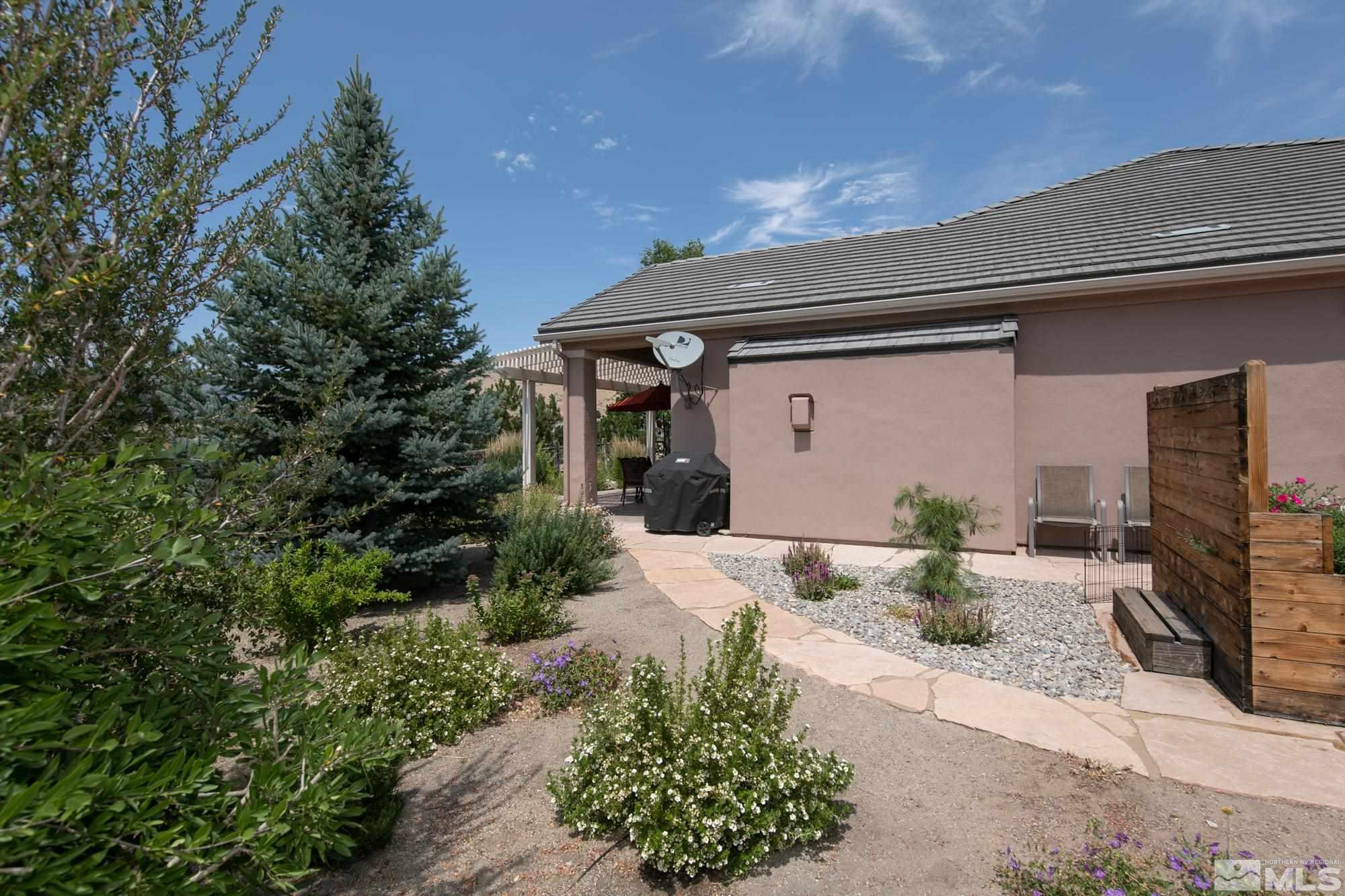 1605 Ashland Bluff Way Reno, NV 89523 - Photo 37 of 37 a front view of a house with garden
