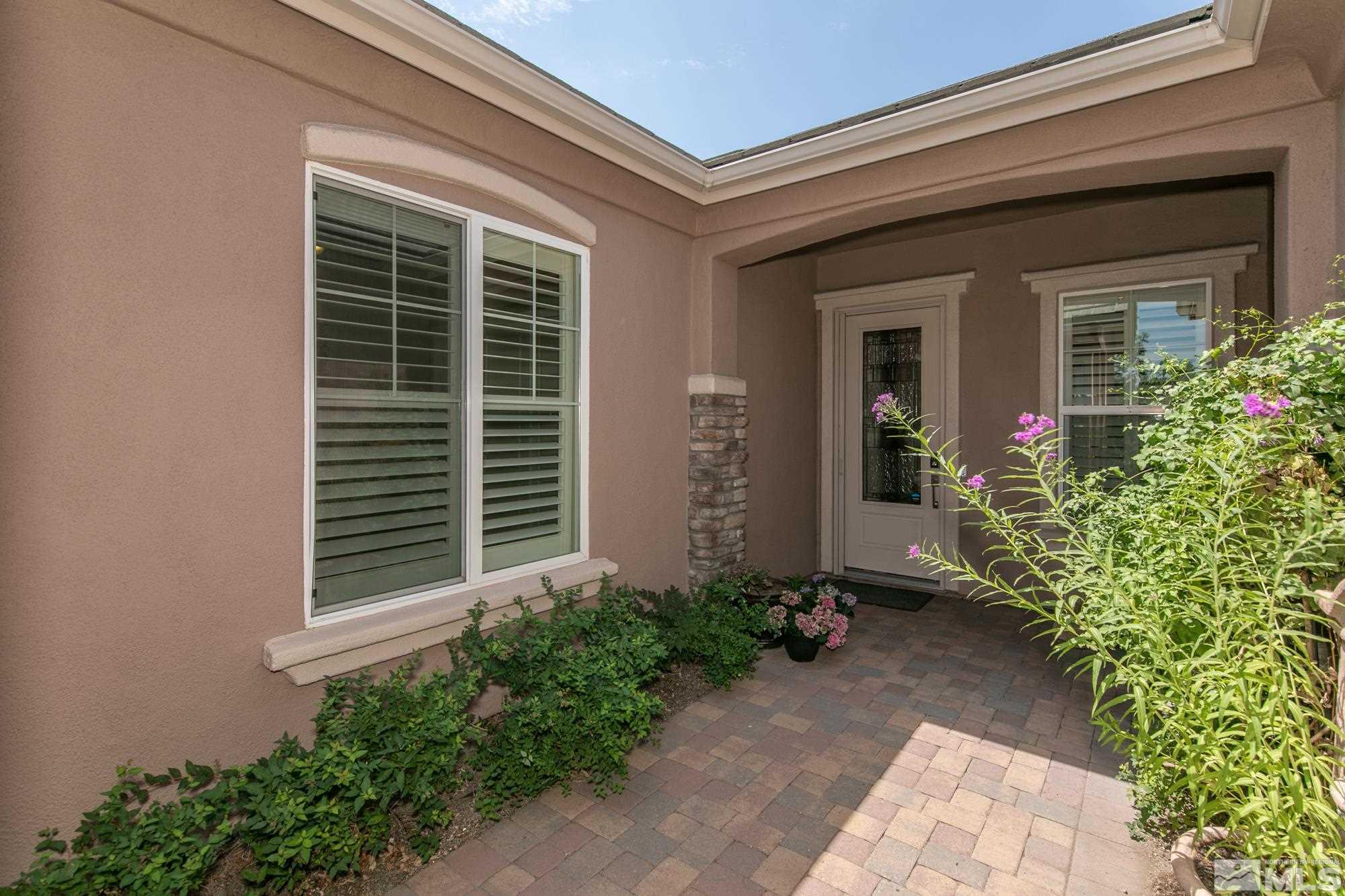 1605 Ashland Bluff Way Reno, NV 89523 - Photo 4 of 37 a front view of a house with plants