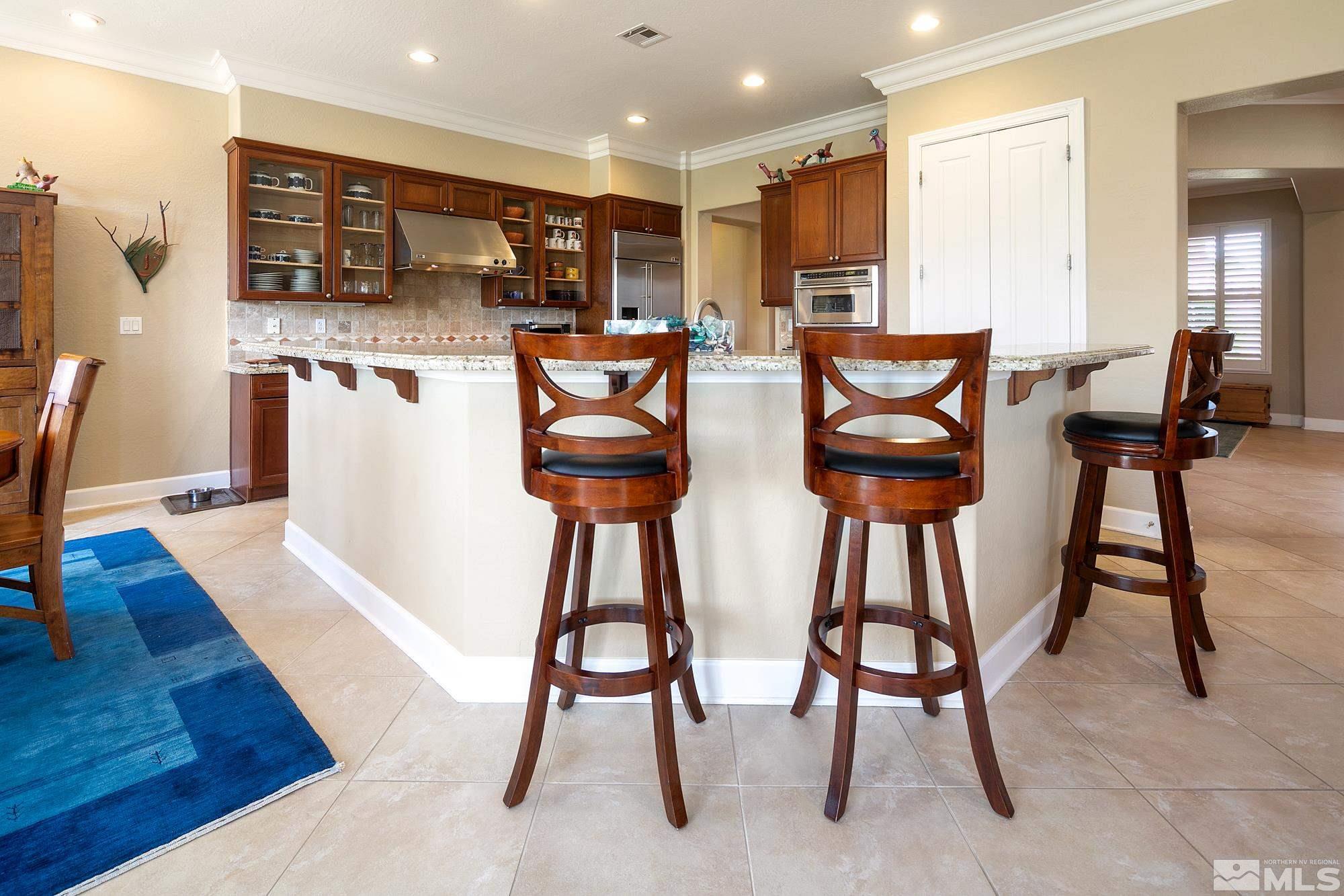 1605 Ashland Bluff Way Reno, NV 89523 - Photo 8 of 37 a view of a dining room with furniture