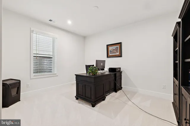 a room with a bed and a window