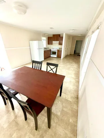 a living room with a couch and a table