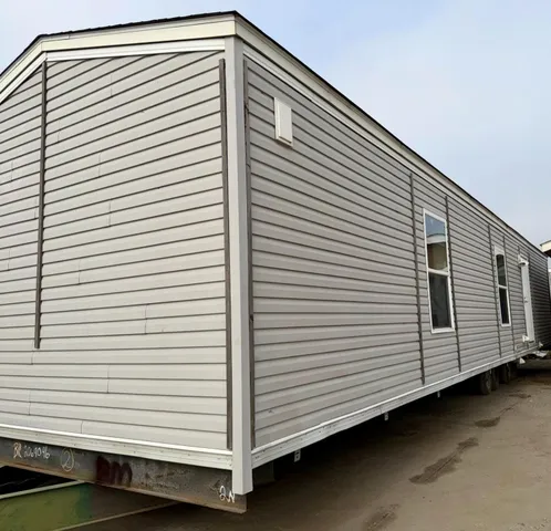 a view of a white house with a white roof