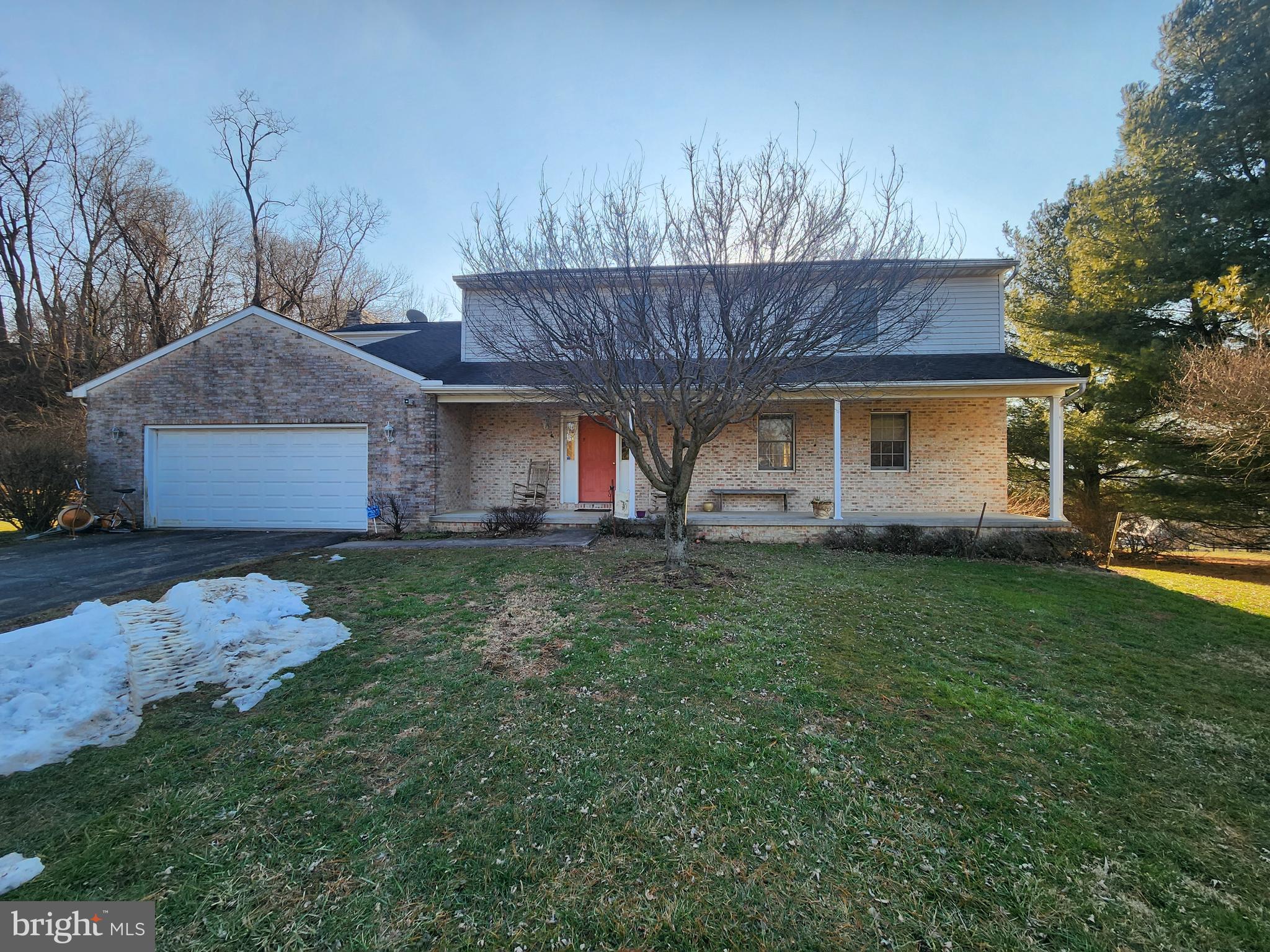 290 Locust Grove Road Bainbridge, PA 17502 - Photo 64 of 108 a front view of a house with a garden
