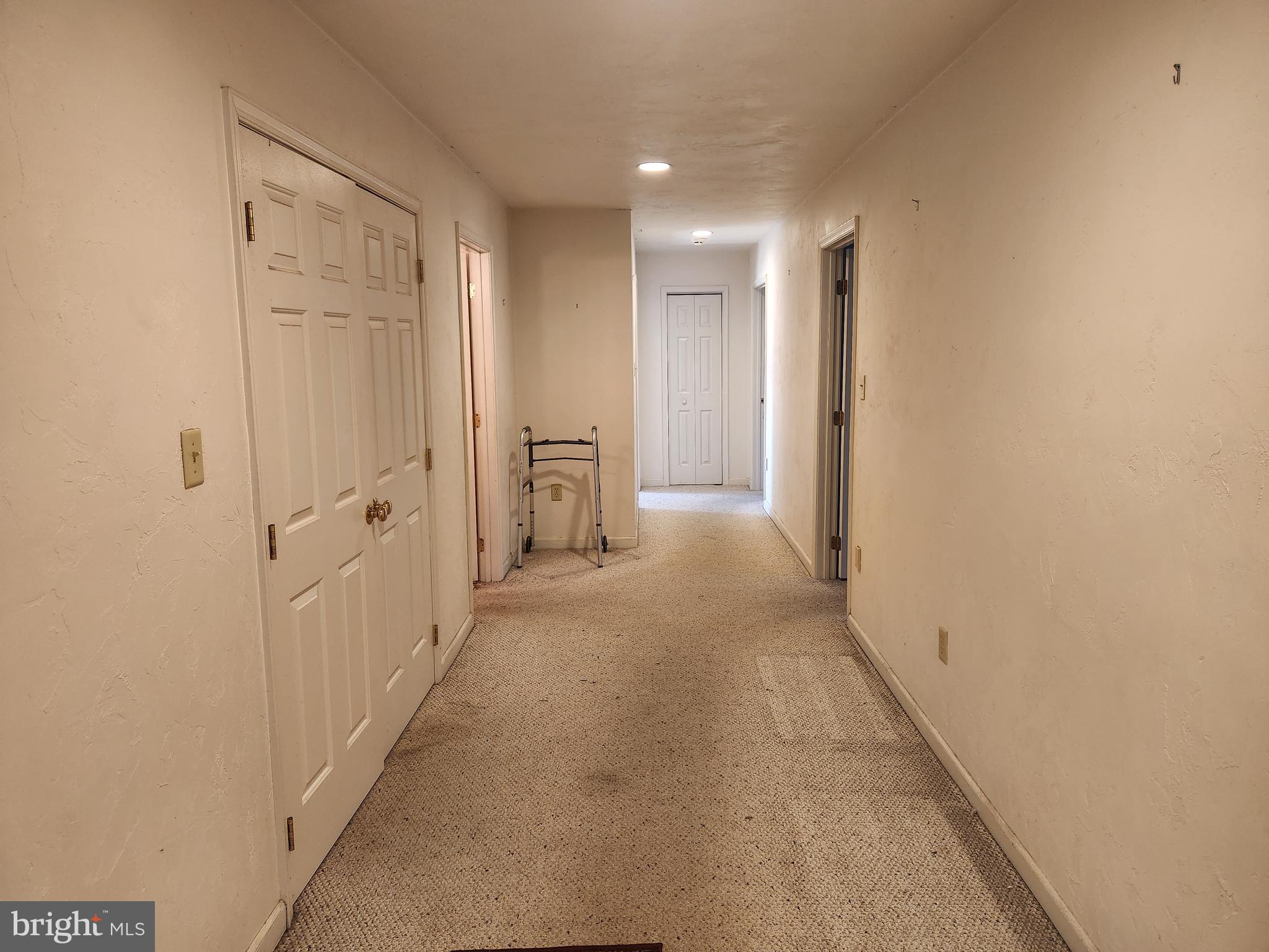 290 Locust Grove Road Bainbridge, PA 17502 - Photo 7 of 108 a view of a hallway with wooden shelves