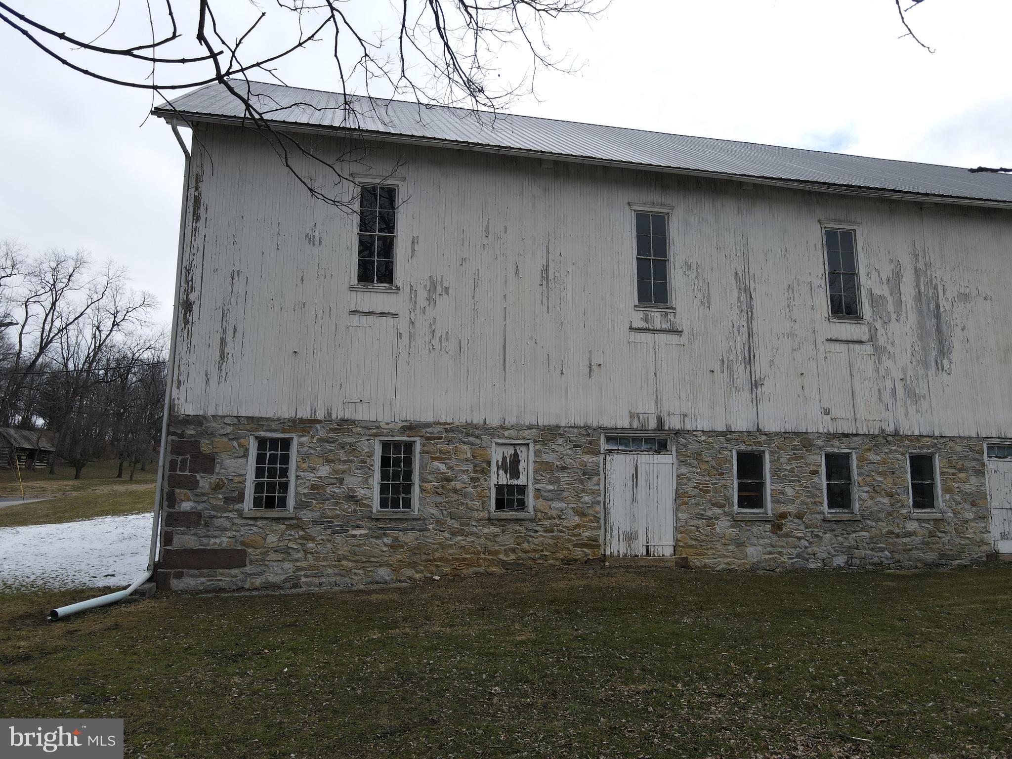 290 Locust Grove Road Bainbridge, PA 17502 - Photo 71 of 108 a front view of a house with a garden