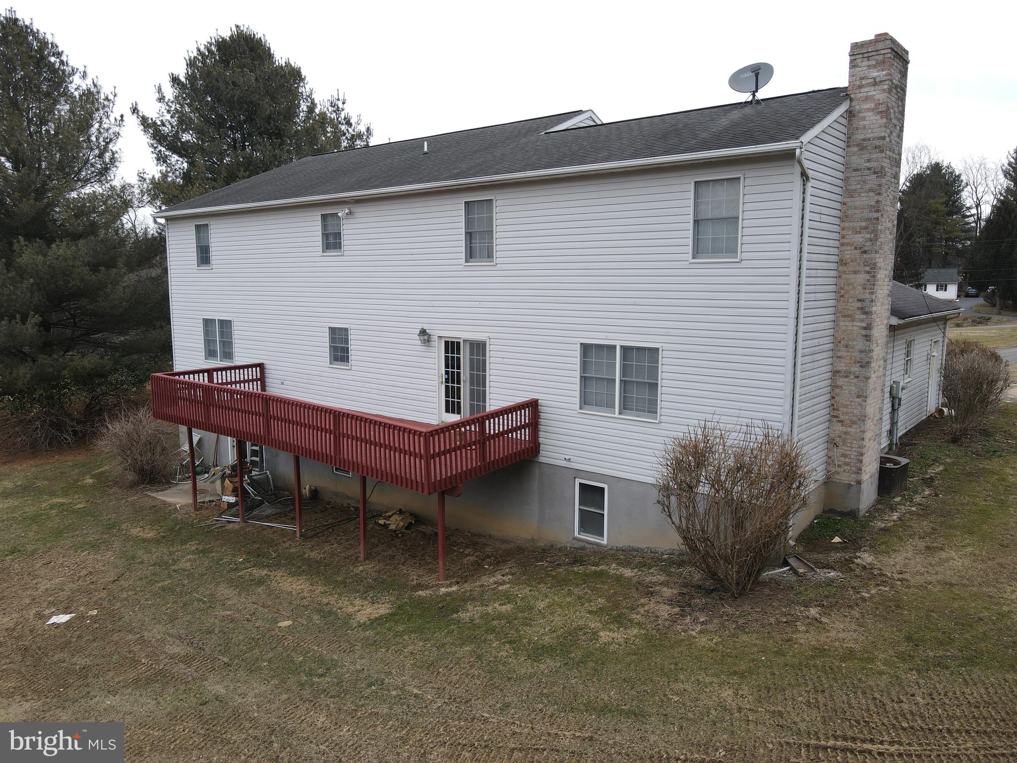 290 Locust Grove Road Bainbridge, PA 17502 - Photo 97 of 108 a view of a house with a yard and sitting area