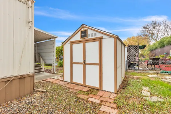 a view of a back yard of the house