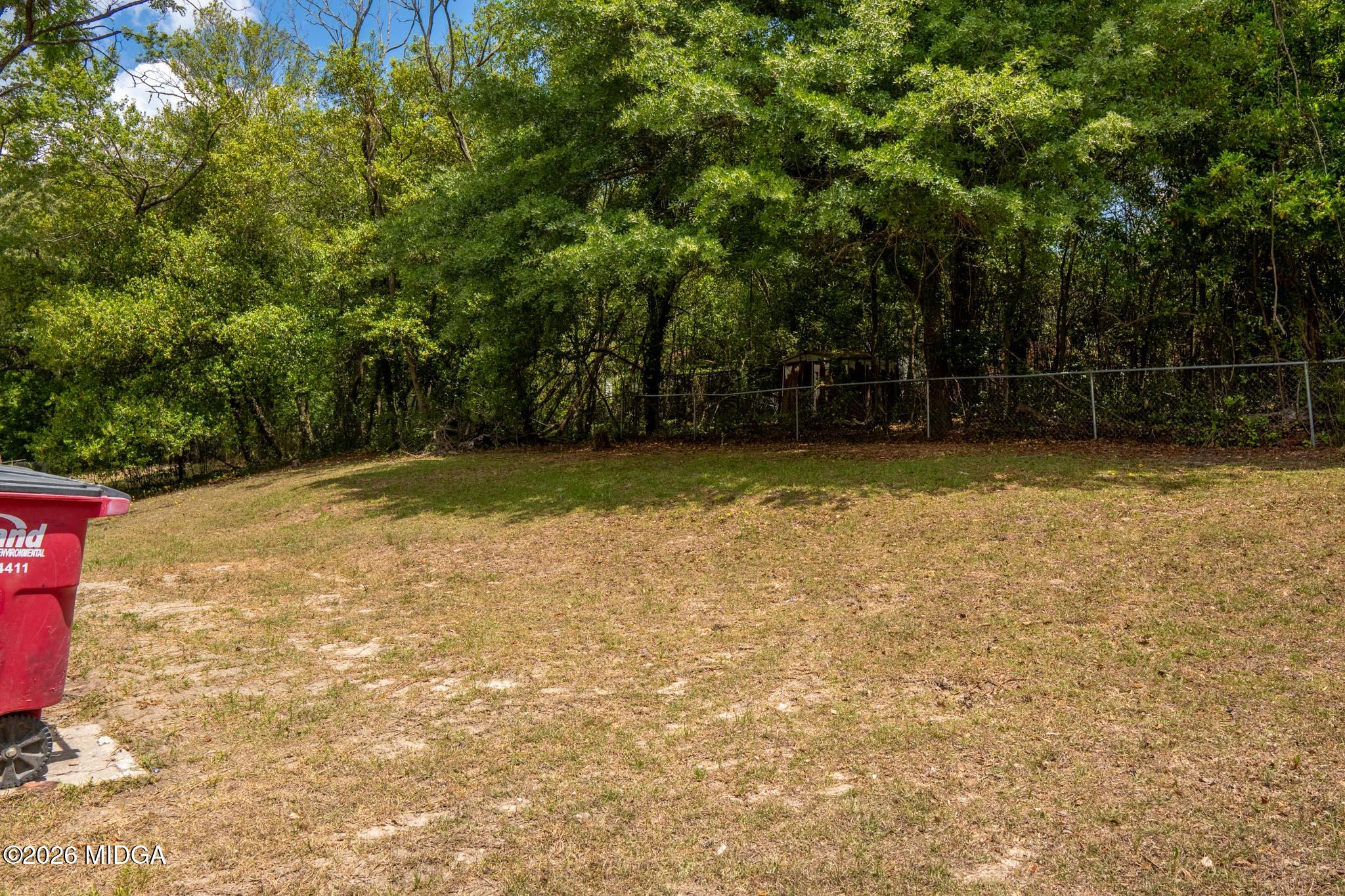 3319 Mohawk Road Macon, GA 31217 - Photo 10 of 38 a view of a swimming pool with a yard