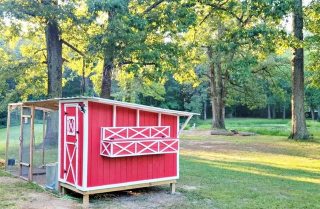 a living room with furniture and a mirror