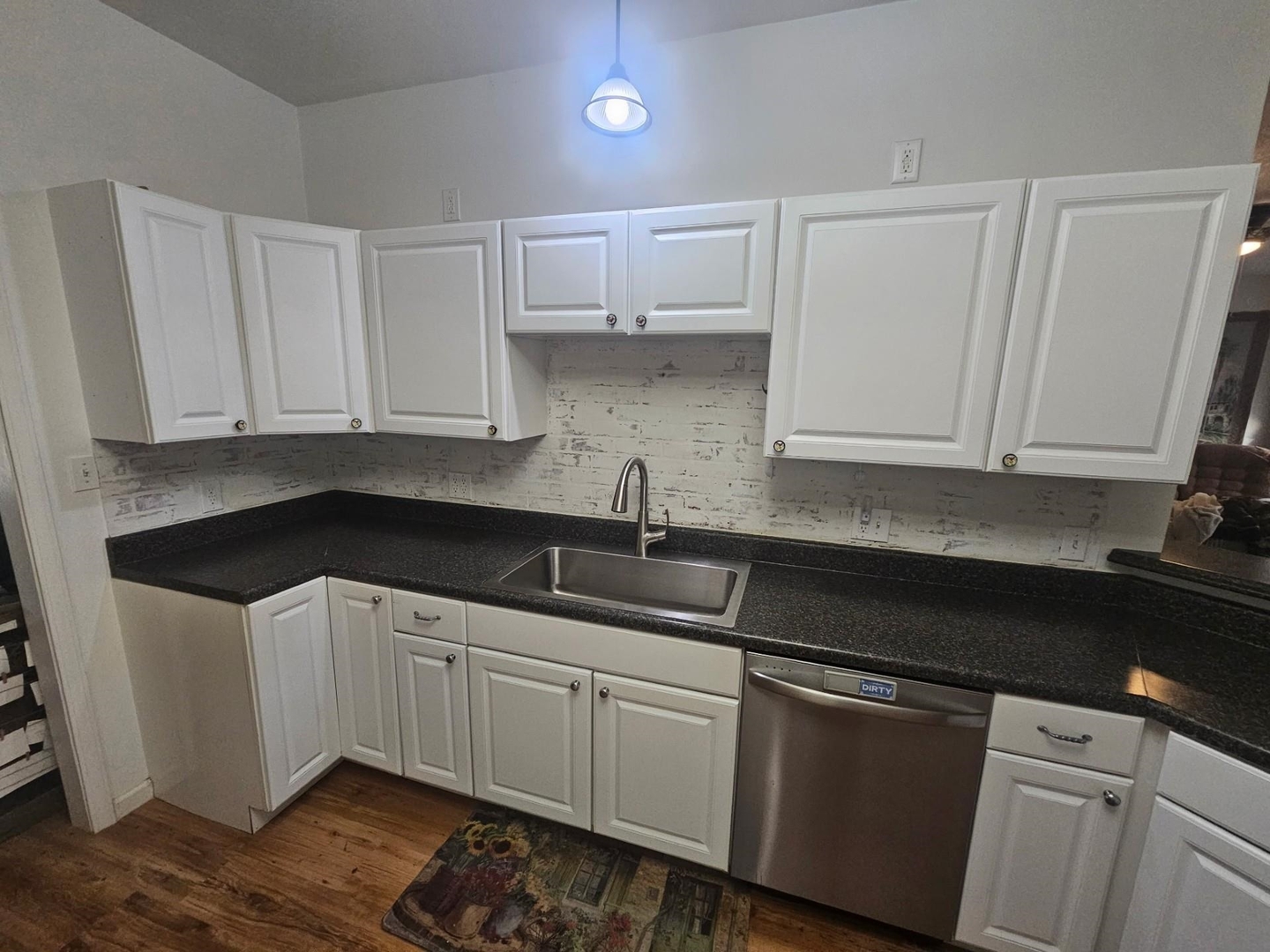 1600 Scott Street Metropolis, IL 62960 - Photo 7 of 23 a kitchen with sink cabinets and window