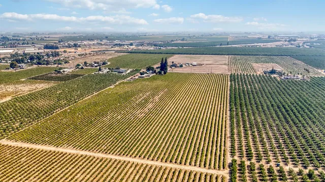 a view of street with parked cars