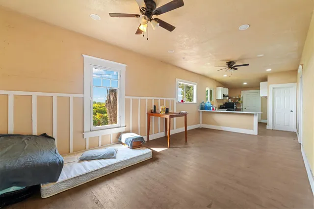 a kitchen with stainless steel appliances a refrigerator and a sink