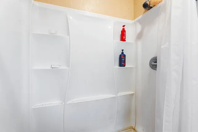 a view of a workspace with furniture