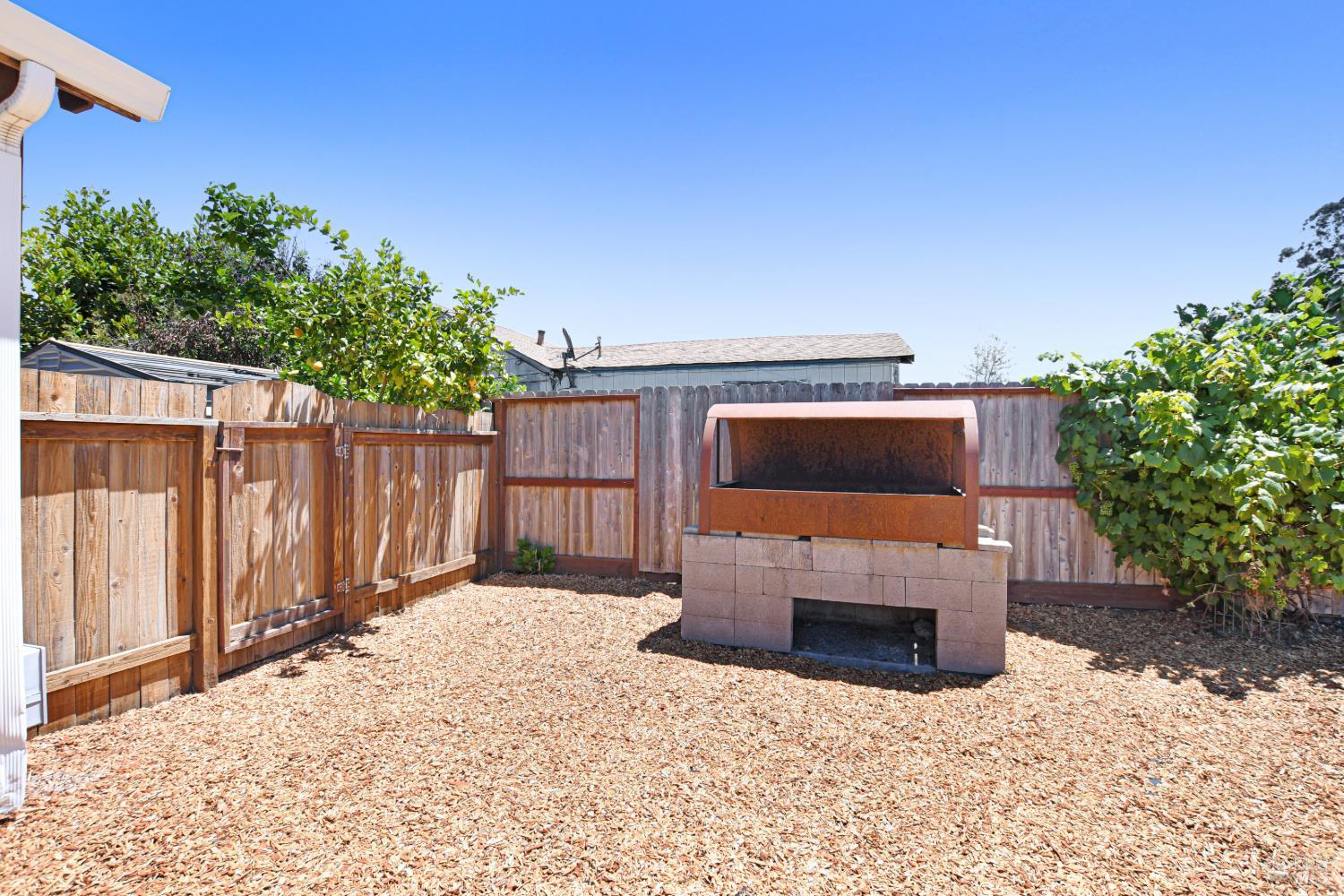 866 Yuba Drive Santa Rosa, CA 95407 - Photo 30 of 73 BBQ/SMOKER AREA TO THE REAR OF COTTAGE