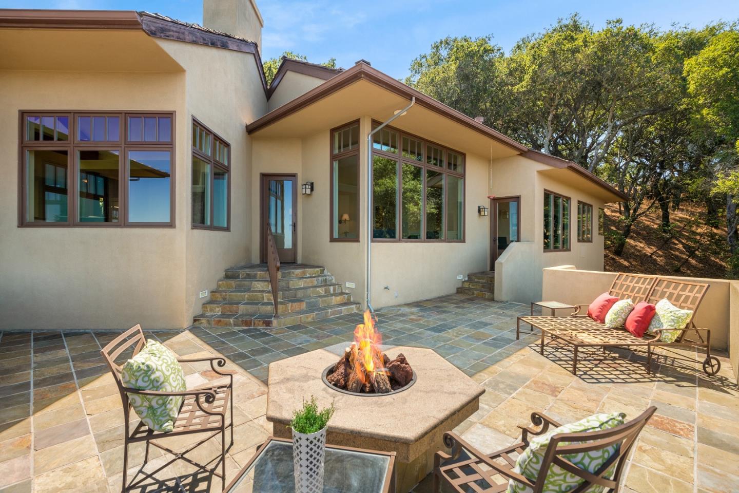 1795 Foster Road Los Gatos, CA 95030 - Photo 15 of 56 a view of a patio with couches table and chairs and potted plants