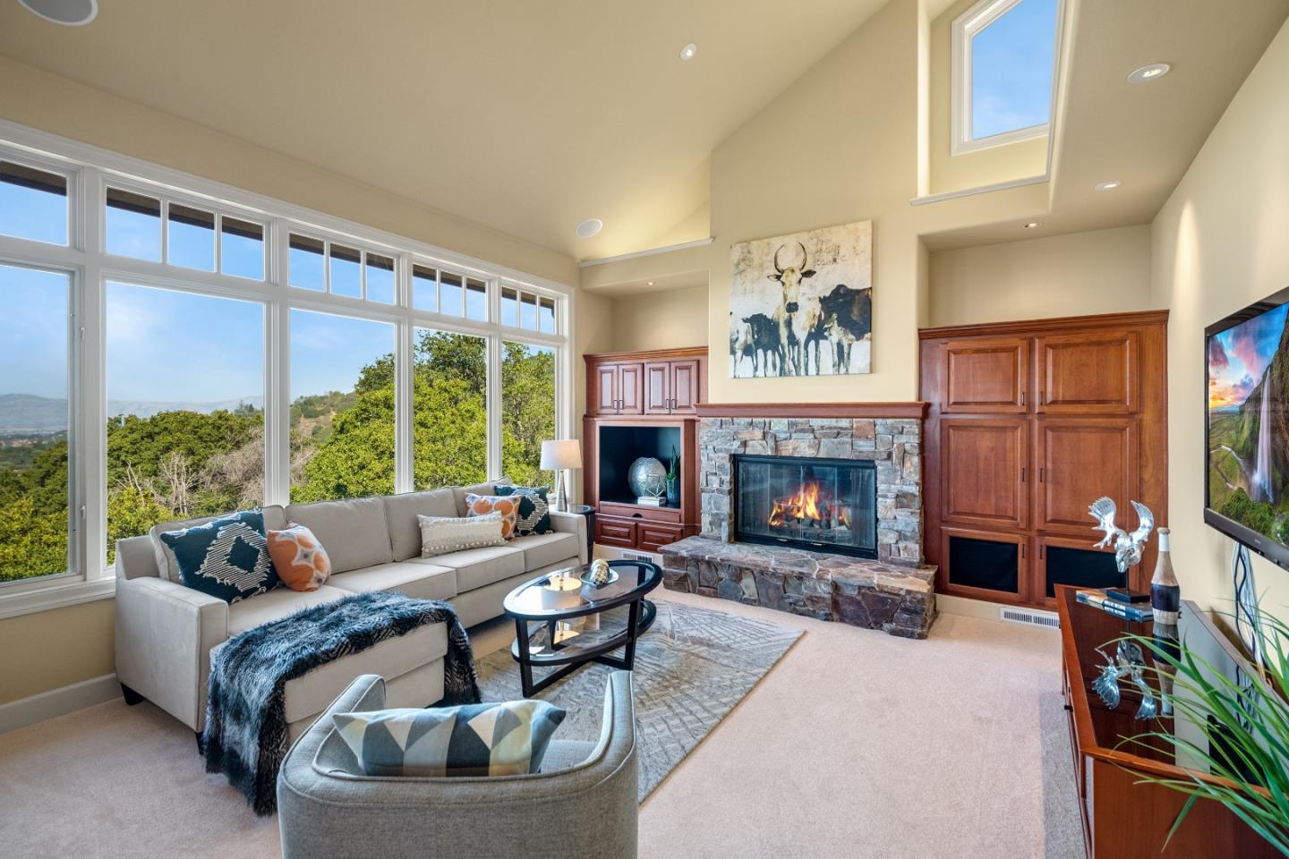 1795 Foster Road Los Gatos, CA 95030 - Photo 25 of 56 a living room with furniture and a fireplace
