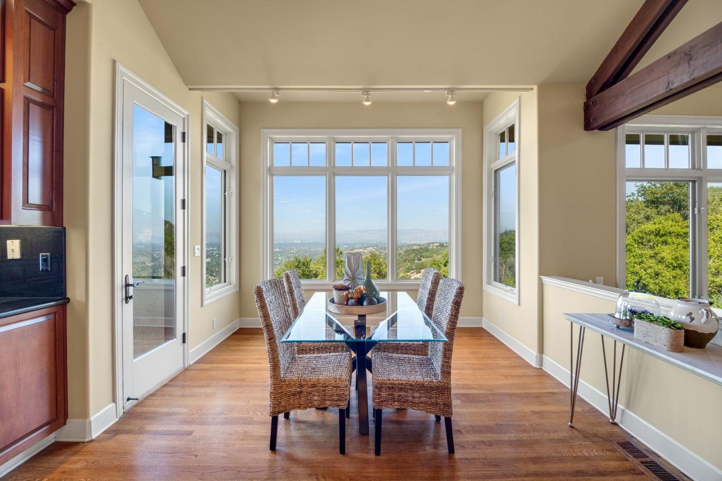1795 Foster Road Los Gatos, CA 95030 - Photo 27 of 56 a dining room with furniture window and wooden floor