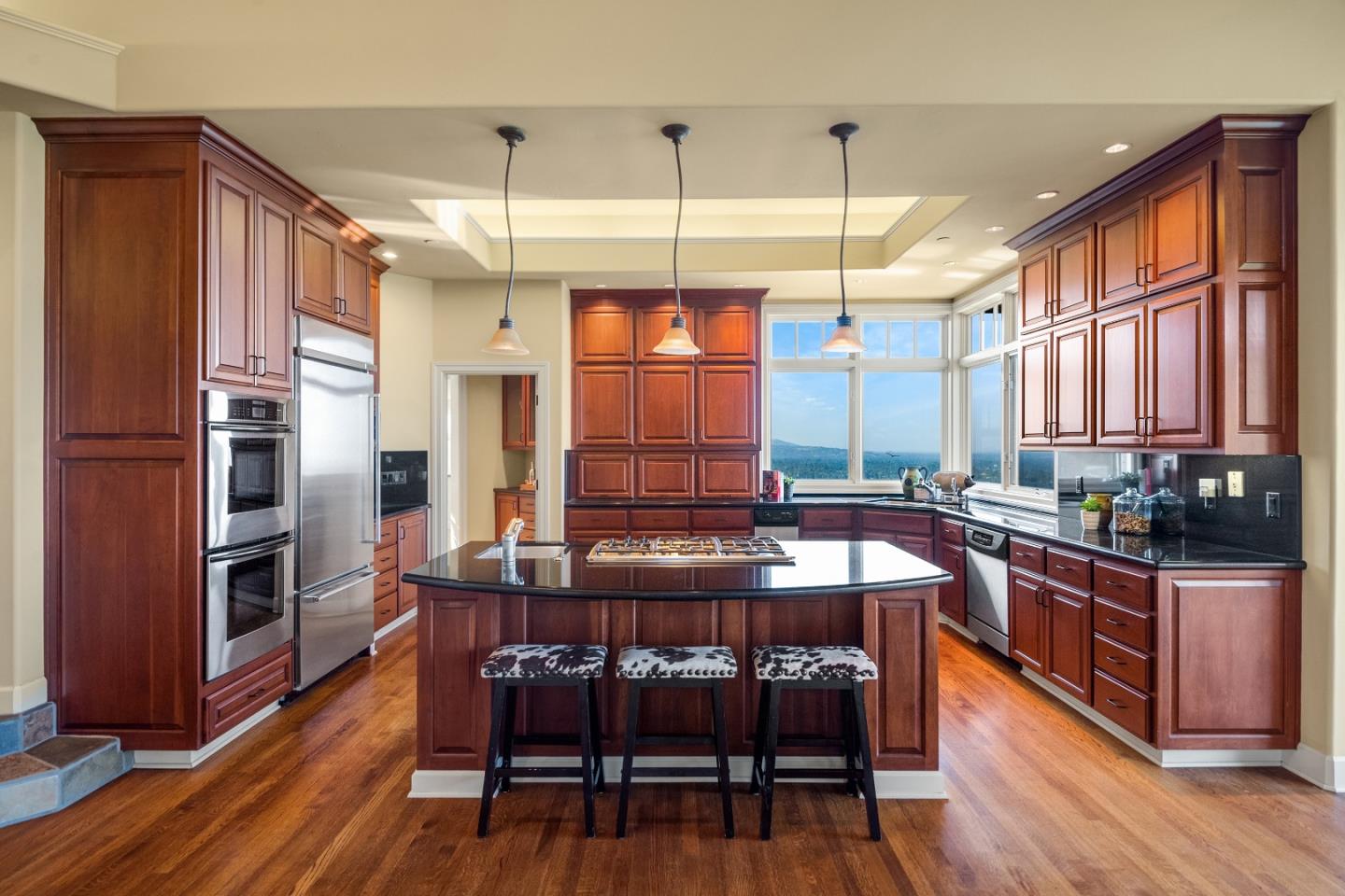 1795 Foster Road Los Gatos, CA 95030 - Photo 33 of 56 a kitchen with stainless steel appliances granite countertop a stove and refrigerator