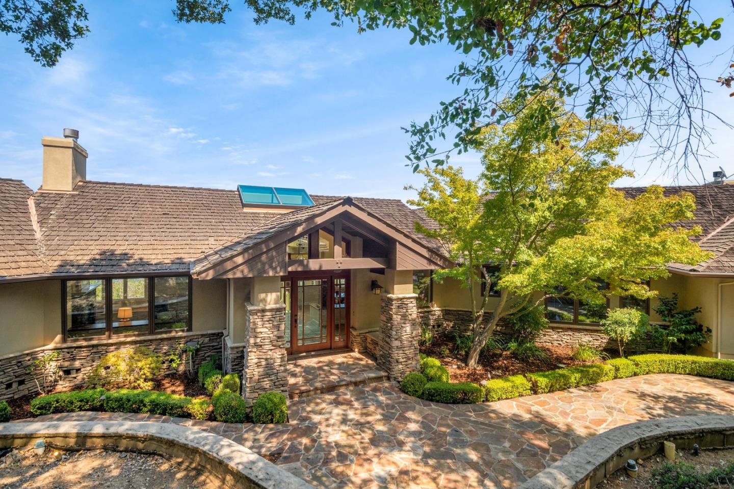 1795 Foster Road Los Gatos, CA 95030 - Photo 4 of 56 a front view of a house with a porch