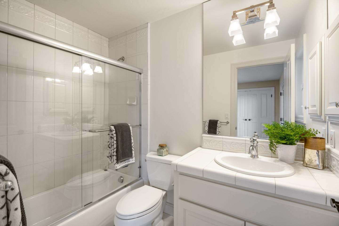 1795 Foster Road Los Gatos, CA 95030 - Photo 48 of 56 a bathroom with a sink a toilet and shower