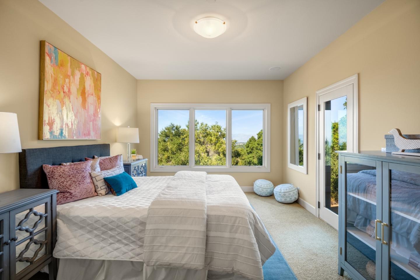 1795 Foster Road Los Gatos, CA 95030 - Photo 49 of 56 a bedroom with a bed and window with chair