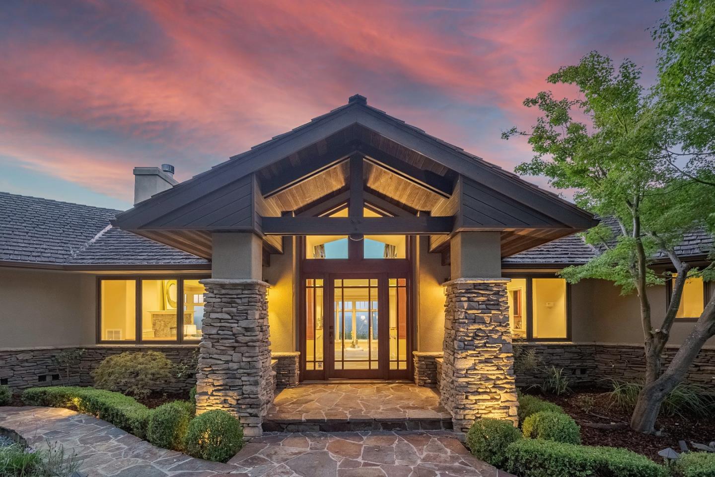 1795 Foster Road Los Gatos, CA 95030 - Photo 5 of 56 a front view of a house with a yard