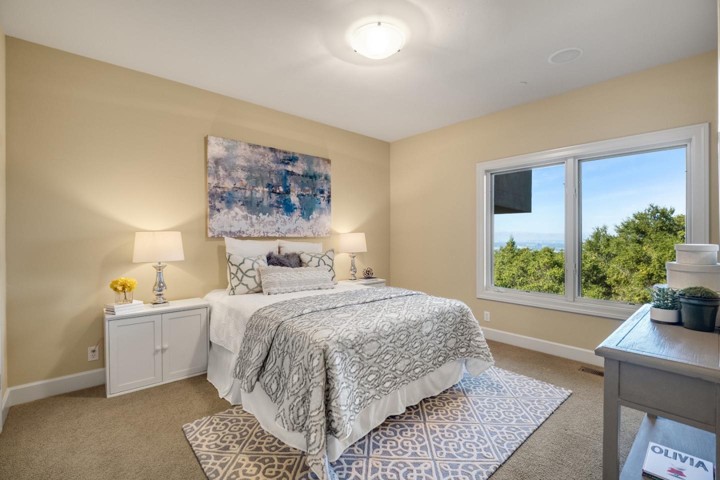 1795 Foster Road Los Gatos, CA 95030 - Photo 51 of 56 a bedroom with a large bed and a window