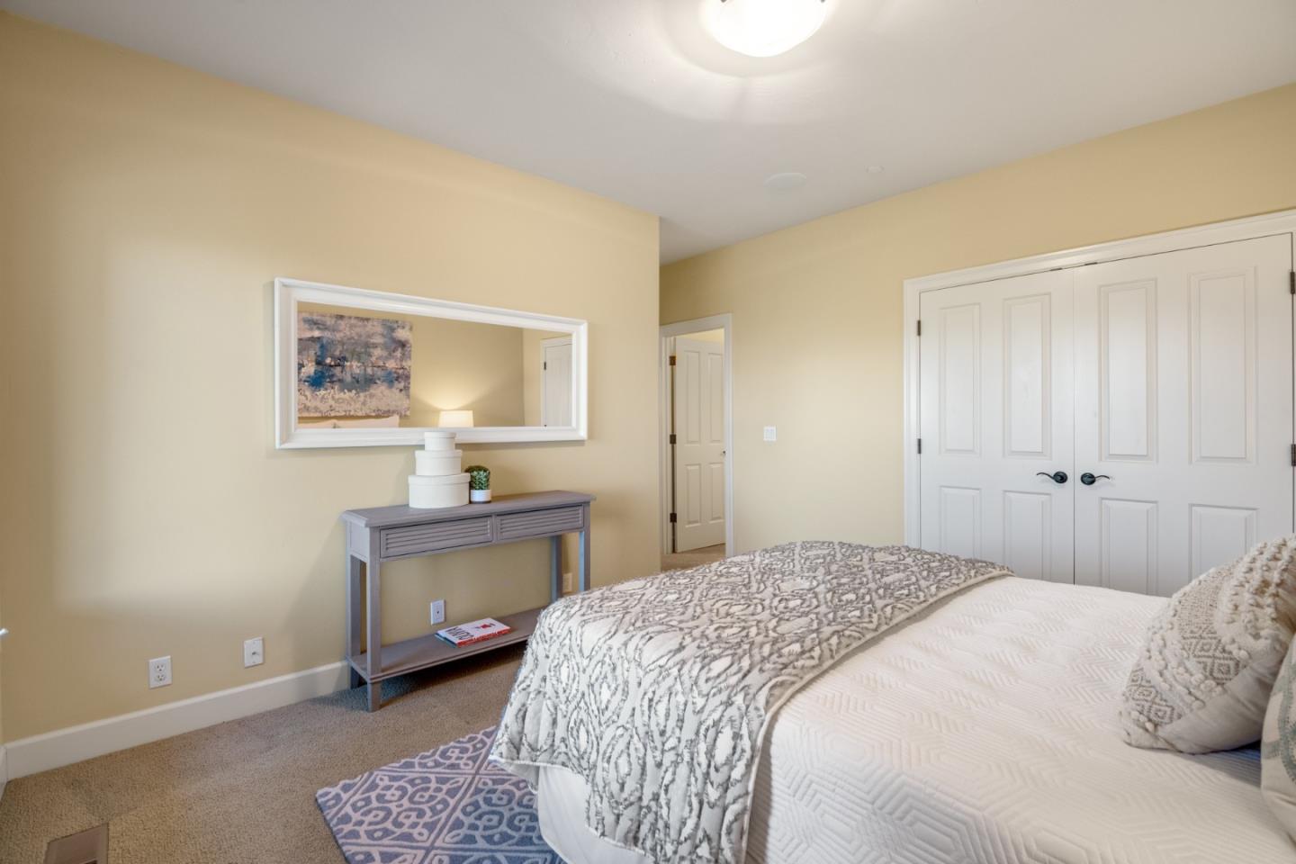 1795 Foster Road Los Gatos, CA 95030 - Photo 52 of 56 a bedroom with a bed and a desk