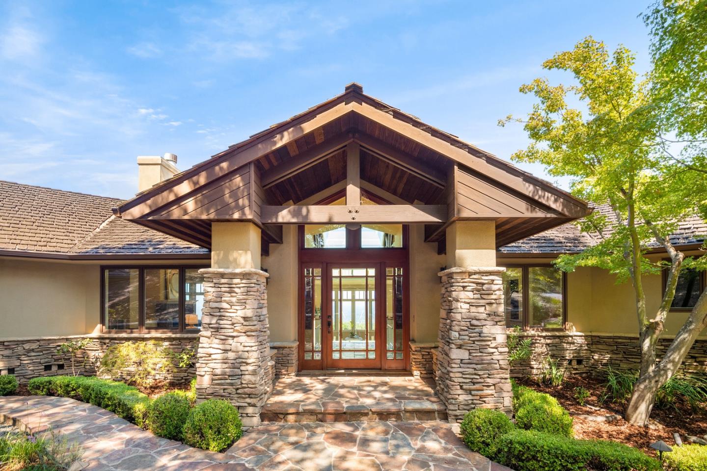 1795 Foster Road Los Gatos, CA 95030 - Photo 6 of 56 a front view of a house with garden