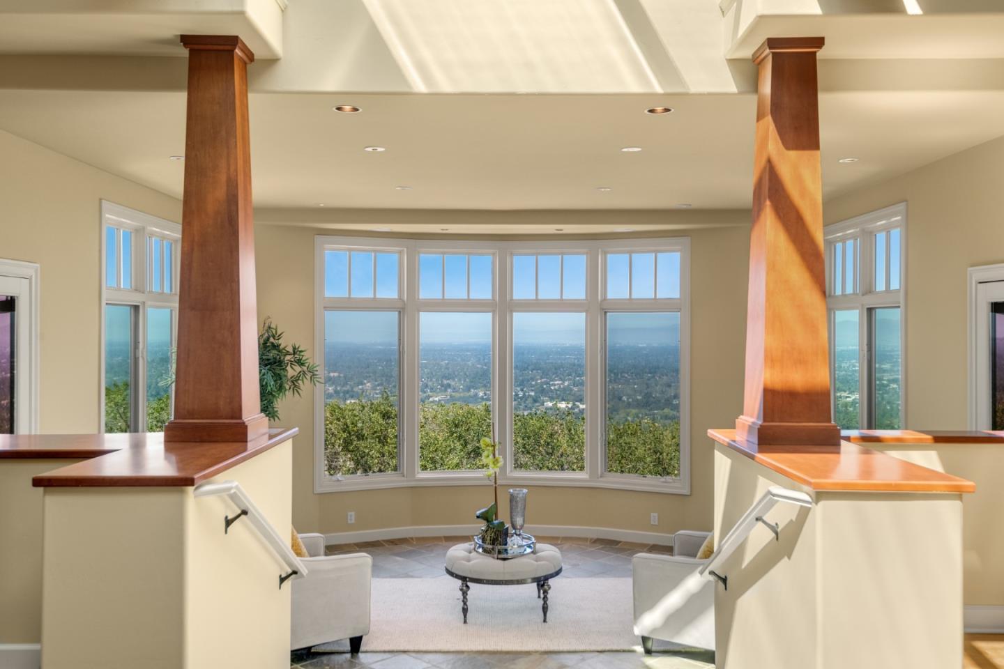 1795 Foster Road Los Gatos, CA 95030 - Photo 10 of 56 a living room with a fireplace furniture and a large window