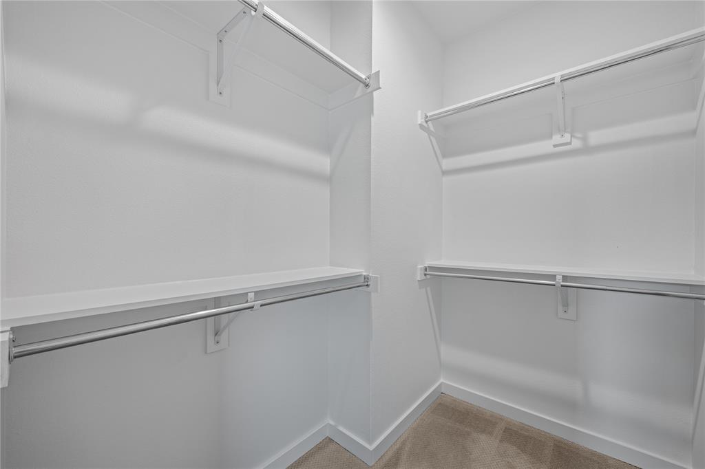 1715 Bennett Avenue, Unit 104 Dallas, TX 75206 - Photo 29 of 35 a view of an empty walk in closet